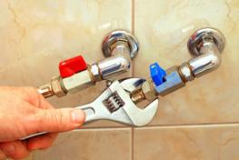 plumber in Flower Mound Texas adjusts water lines